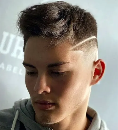 Textured Tousled Top with Mid Tape Fade Shaved Line Design